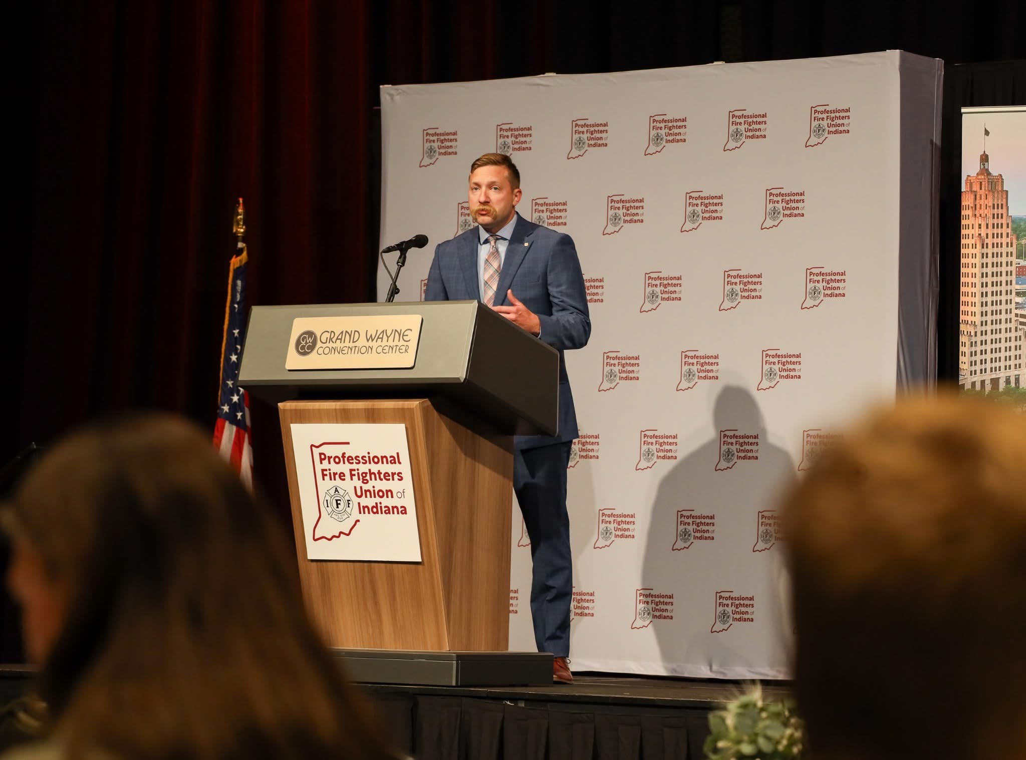 Dillon speaking at a Professional Fire Fighters Union of Indiana event